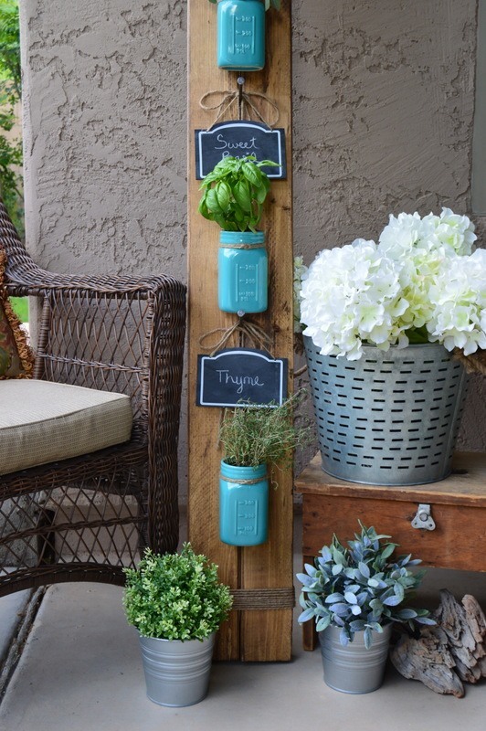 23 Beautiful & Practical Ways To Upcycle Mason Jars In The Garden